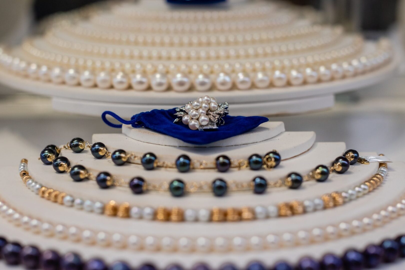 A close up of many different types of pearls